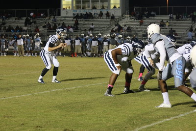 JACE FIELDER, Walton senior quarterback (12) helped lead Walton back from a 7-0 deficit early at East Gadsden to a 35-7 win that has the Braves 9-0 on the year entering their final road game of the regular season at Panama City Bay on Thursday night. (Photo by Teresa Bogart)