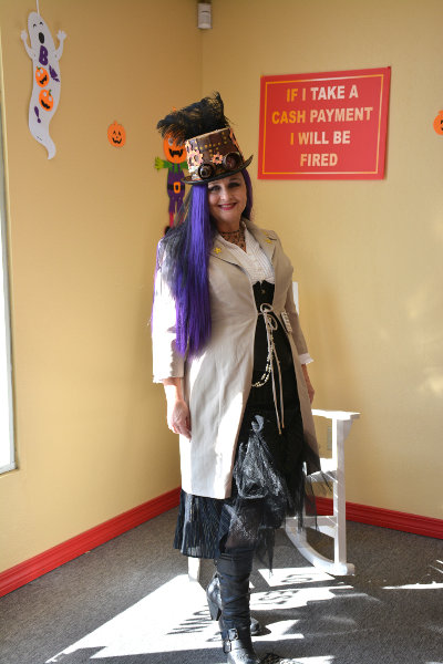 WANDA STEWART OF CHECK-MAN got into the Halloween spirit. She and her boyfriend created a one-of-a-kind costume, a Steam Punk Stewardess. The costume definitely was an original, representing the pre-industry age. A costume and a history lesson all in one. (Photo by Norma Rediker)