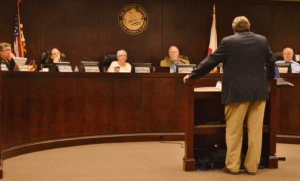 WAYNE DYESS, Walton County planning and development services director, brings forward planning items at the Dec. 22 meeting. (Photo by Dotty Nist)