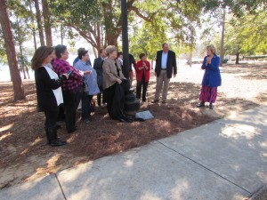 UNVEILING OF THE MARKER honoring Lt. Col. Juanita Little as a Woman of Light. Little's sister Grace Marse (left of marker) did the honors, surrounded by members of Little's family.