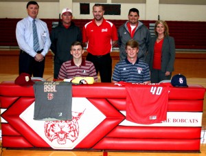 PAXTON’S GRANT STEWART AND AUSTIN FRANKLIN signed baseball scholarships with FSU and Samford University, respectively, on Wednesday, Feb. 10, at a ceremony attended by many friends, family members, classmates and community members. Proud Paxton administrators Cindy Neale and Mitch Jackson, along with past and present baseball coaches Jeff Bradley, Chris Davenport and Nate Moore were also in attendance at the historic event. (Photo by Reid Tucker)