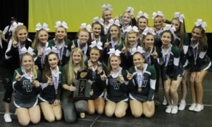 TEAM AND TROPHY: SWHS Competitive Cheerleading Team took the title at the 2016 Florida High School Athletic Association Competitive Cheerleading State Championship. 