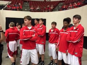 THE PAXTON BOYS BASKETBALL TEAM was focused moments before they took the floor in Lakeland and defeated Bell High School 63-50 to advance to the Class A title game on Wednesday afternoon at 4 p.m. against defending state champion Chipley. (Photo courtesy Laurie Gilbert)