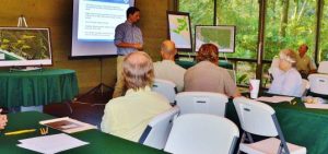 YLER MALDONADO speaks to attendees at the June 7 public hearing on Deer Lake State Park. (Photo by Dotty Nist)