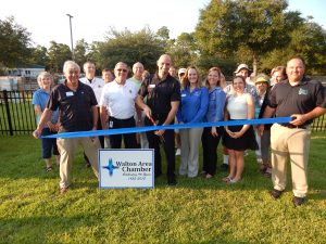 DINNER WAS SERVED along with some information and door prizes at the ribbon cutting. Community, chamber, and co-op members got to see a glimpse of what a sunny future might look like with the Walton Area Chamber of Commerce ribbon cutting at the new Choctawhatchee Electric Cooperative, Inc.(CHELCO) solar demo the afternoon of Sept. 8.