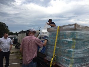 CONSOLIDATED EFFORT: The DeFuniak Springs Kiwanis Club in conjunction with The Matrix, the Paxton Key Club, First Apostolic Church and Consolidated Ace Hardware, delivered two large trailer loads of clothes, building supplies, bottled water, toys, linens and sleeping bags to displaced families in Gonzales, Louisiana. 