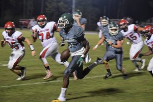 JIREH CRITTENDEN (5) had another big night with 83 rushing yards and a 102-yard interception return that set up South Walton's only touchdown in the victorious game against Blountstown. (Photo by Jeffrey Powell)