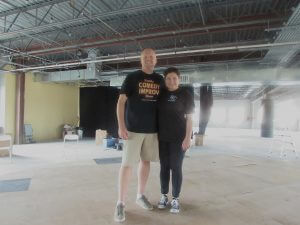 NATHANAEL AND ANNA FISHER on stage. The Fishers are co-founders and artistic directors of the Emerald Coast Theatre Company, which moved into its new quarters at 560 Grand Blvd. Upstairs last week. (Photo by Bruce Collier)