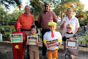 DBPA Halloween Happening Winners (ages 5-7) (l-r), front, Elijah Odom-Honorable Mention, Jeremiah Curry-3rd Place, Nathan Fenlon-2nd Place, Gage Ramsey-1st Place (L to R back ) Joe Brown (City), Craig Drake (City), Joy Brown (Wal Mart). Photo by Cathy Mosley