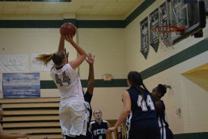 SOUTH WALTON SENIOR CENTER Savannah Slade (44) made a basket in the early minutes of South Walton's 59-53 home victory against Holmes County on Friday night. The University of North Florida signee scored 24 points and gave South Walton several second chance shots with great rebounding. (Photo by Blake McCormick)